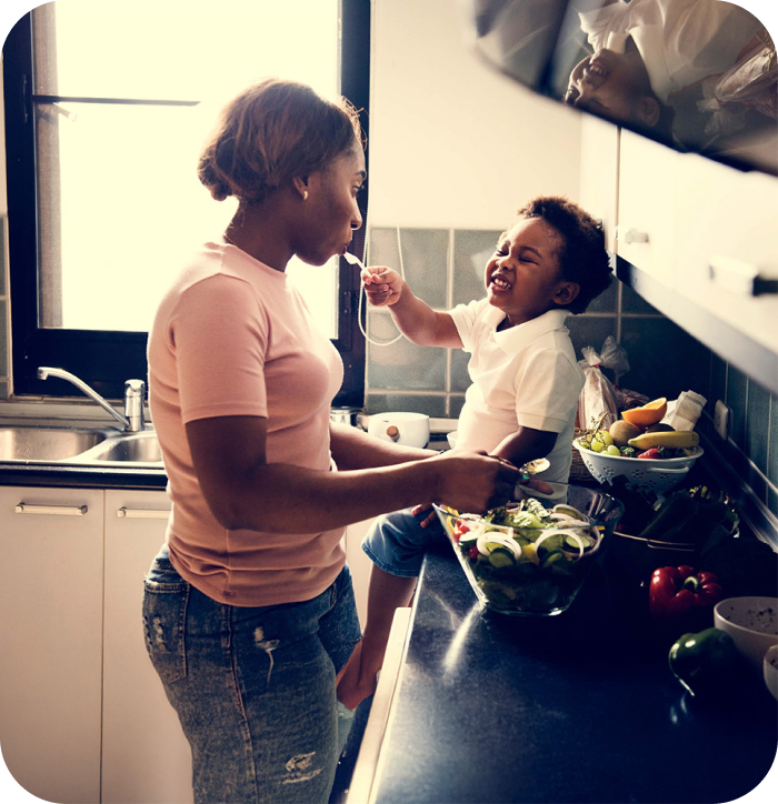 mother and her child in a kitchen