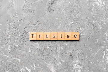 scrabble letters that say trustee