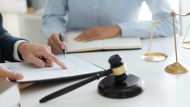 estate planning lawyer speaking with client